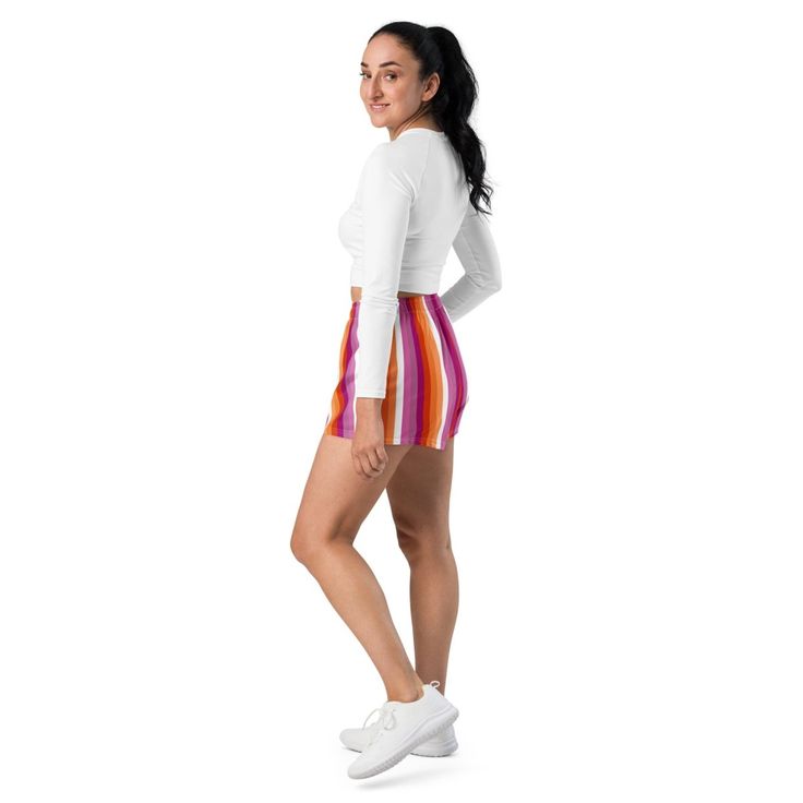 Add these cute lesbian shorts to your pride wardrobe. These lesbian sunset flag stripe shorts are a great way to show off your gay pride and not only are they super cool for pride events and festivals, they are functional athletic shorts made for swimming, running and other sporting activities and you'll won't want to be without them when heading to the beach or lounging by the pool. You'll also appreciate the mesh pockets large enough to hold your phone. DETAILSComfortable elastic waistband wit Summer Multicolor Skort With Built-in Shorts, Casual Summer Cheerleading Skort, Trendy Striped Shorts With Built-in Shorts, Pink Shorts With Built-in Liner For Cheerleading, Casual Athletic Shorts For Cheerleading, Casual Rainbow Bottoms For Pride, Multicolor Athletic Shorts With Built-in Shorts For Spring, Summer Cheerleading Skort, Sporty Summer Cheerleading Bottoms