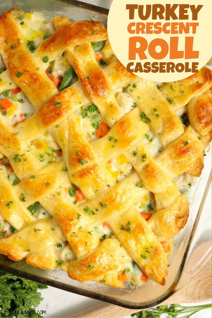 turkey crescent roll casserole in a glass baking dish with parsley on top