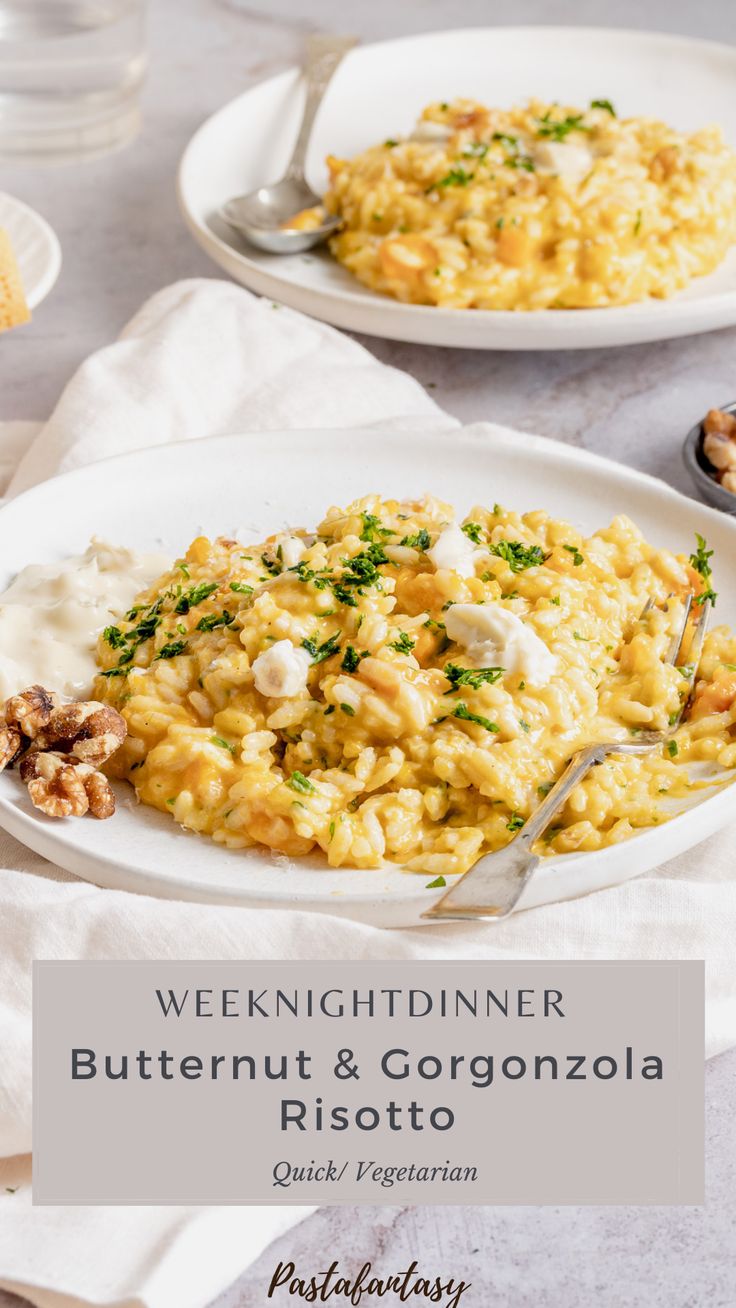 a white plate topped with risotto next to another plate