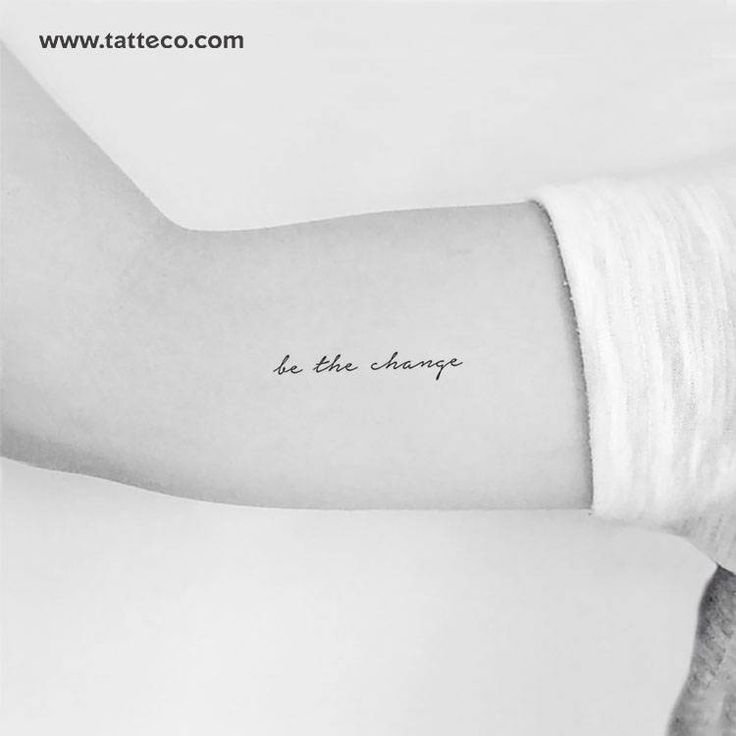 a woman's arm with the words be the change on it