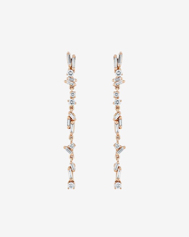 Crafted in 18-karat gold, these exquisite drop earrings are the perfect blend of elegance and sparkle. Set with a mix of round and baguette diamonds in our timeless 'Fireworks' design. Details 18k yellow gold, rose gold or white gold 0.42 carats of baguette and round white diamonds 1.5" inches length Ref: BAE426 Luxury Rose Gold Baguette Cut Earrings, Rose Gold Baguette Cut Diamond Earrings, Luxury Rose Gold Earrings With Baguette Diamonds, Evening Baguette Diamond Dangle Earrings, Evening Dangle Earrings With Baguette Diamonds, Rose Gold Baguette Diamond Earrings For Formal Events, Rose Gold Baguette Cut Earrings For Formal Events, Rose Gold Baguette Cut Earrings For Formal Occasions, Luxury Rose Gold Baguette Diamond Earrings