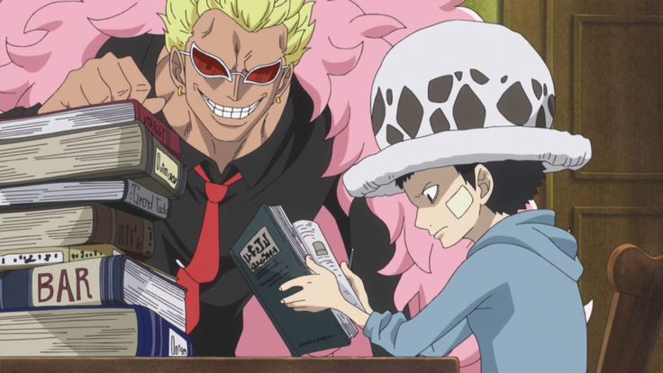 two anime characters sitting at a table with books on top of them and one holding a book in his hand