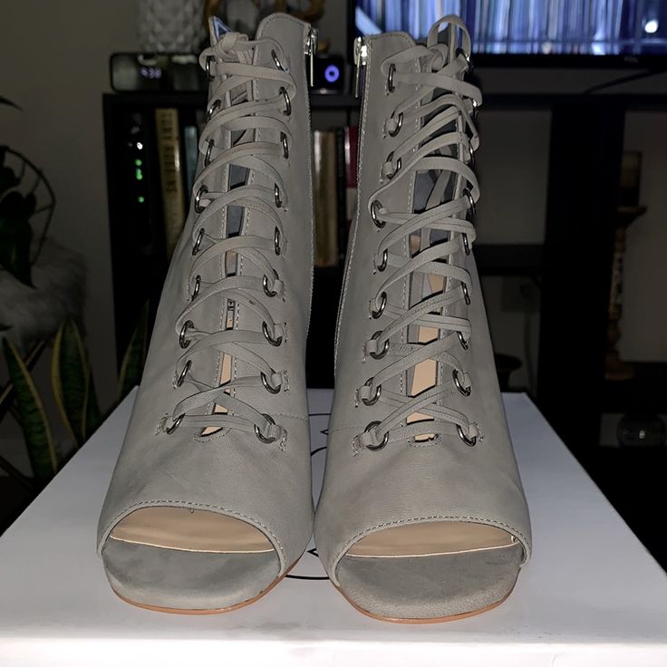 Steve Madden Women's Freemee Lace-Up Booties. These Beautiful Never Worn Boots Have A Zipper On The Side To Create Easy Put On/Take Off Access. Gray Block Heel Heels, Chic Lace-up Heels With Wrapped Heel And Medium Width, Chic Lace-up Heels With Wrapped Heel, Lace-up Heels With Wrapped Heel, Spring Boots With 4-inch High Heel, Trendy Open Toe Boots With 4-inch Heel, Lace-up Heels With 4-inch Heel Medium Width, Lace-up Heels With 4-inch Heel And Medium Width, Synthetic Open Toe Boots With 4-inch Heel