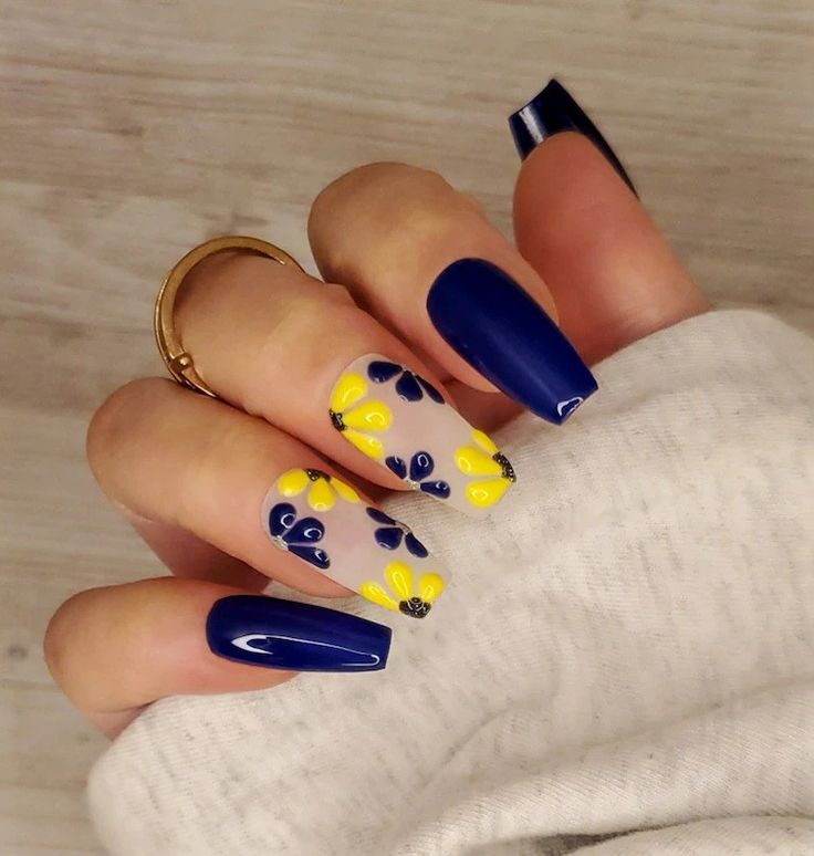 Yellow Snd Blue Nails, Yellow Navy Nails, Navy Blue And Yellow Nails Acrylic, Yellow And Blue Nail Ideas, Blue Nails With Yellow Flowers, Blue And Yellow Spring Nails, Sunflower Nails Blue, Nail Designs Blue Coffin, Blue And Yellow Almond Nails