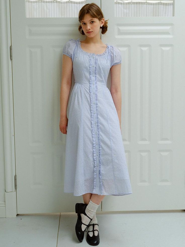 This is a casual and feminine dress by DUNDROP that is made out of high quality and sturdy fabric. With trendy design detail and young vibes, you can style it for your romantic, feminine, and casual daily outfit.- Feminine and girly mood- Ruffle detail along the chest and center front -Shirring detail on the chest, cuffs, and skirt Pretty Dresses With Sleeves, Vintage 1940s Fashion, Spring Feminine Cotton Midi Dress, Feminine Cotton Midi Dress For Spring, Feminine Cotton Midi Dress For Daywear, Cotton Midi Dress With Ruffles, Cotton Midi Dress With Ruffles For Day Out, Puff Sleeve Cotton Maxi Dress With Ruffles, Cotton Maxi Dress With Ruffles And Puff Sleeves