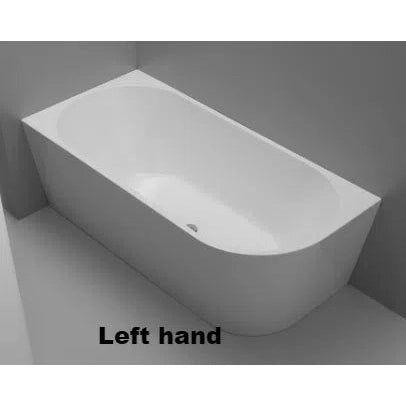 a white bath tub sitting on top of a bathroom floor