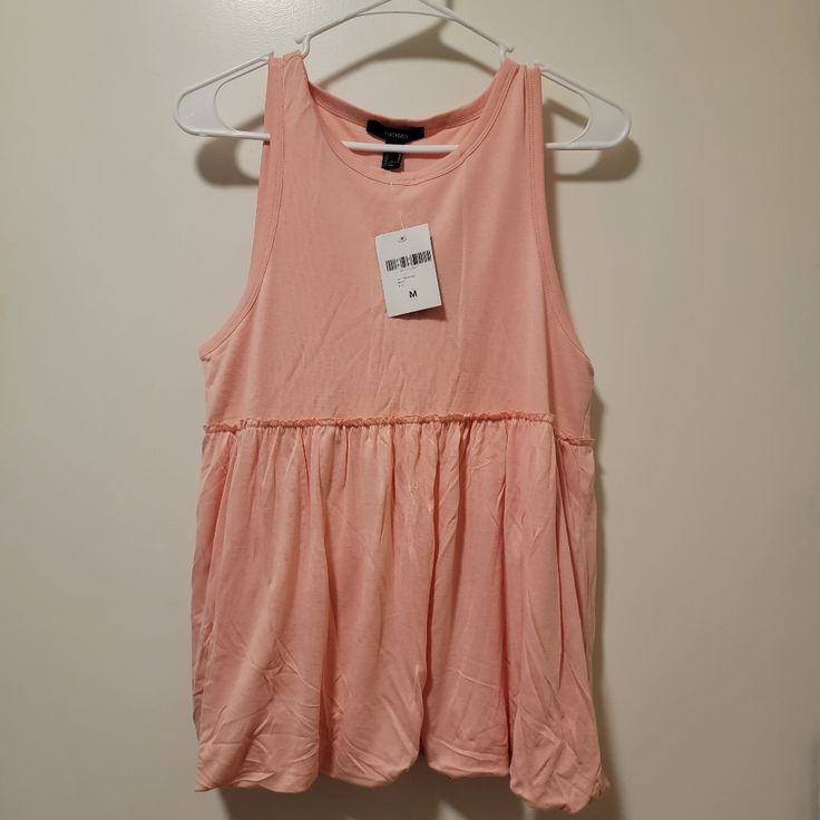 Forever 21 Sleeveless Shirt. Pink Size Medium. New With Tags. Summer Tank Top Vest, Spring Casual Cami Tank Top, Casual Spring Cami Tank Top, Casual Cami Tank Top For Spring, Trendy Sleeveless Tank Top For Day Out, Casual Tank Vest For Summer, Spring Cotton Tank Top, Cotton Tank Top For Spring, Casual Sleeveless Cotton Tank Top