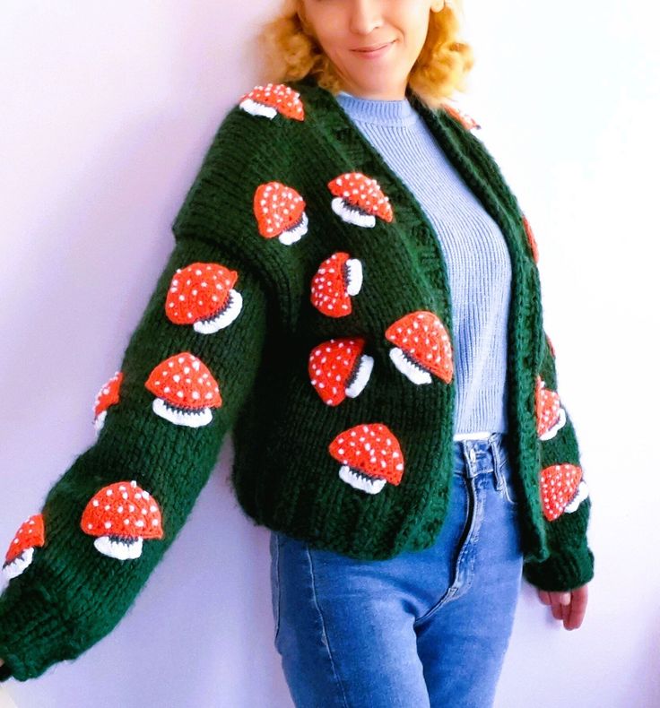 COLOR: green SIZE: XS, S,.M,.L PATTERN:mushroom AREA OF USE: can be used in all seasons LENGTH: 50cm, 55cm The handmade mushroom cardigan, which has become the most trendy fashion of recent times, is knitted with green thick and soft yarn, embroidered with orange mushrooms, and is suitable for sizes S, XS, M and L. This cardigan, which keeps you soft and warm and is an indispensable complementary clothing style for the autumn and winter months, will reach you as soon as possible with the most reliable cargo service. With its emerald green color and orange mushroom embroidery, which is the most suitable color, you will enjoy wearing this cardigan, which is completely handmade, and even give it to your loved ones on their birthdays. You will be able to gift it as a gift on Valentine's Day an Green Knit Cardigan For Fall, Casual Green Knit Cardigan, Green Knitted Fall Cardigan, Green Knitted Crew Neck Outerwear, Green Crew Neck Cardigan For Fall, Green Knitted Winter Cardigan, Green Knit Crew Neck Cardigan, Winter Green Knitted Cardigan, Fitted Green Winter Cardigan