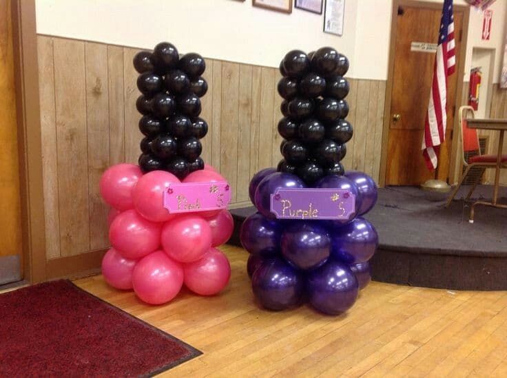 two balloons are stacked on top of each other