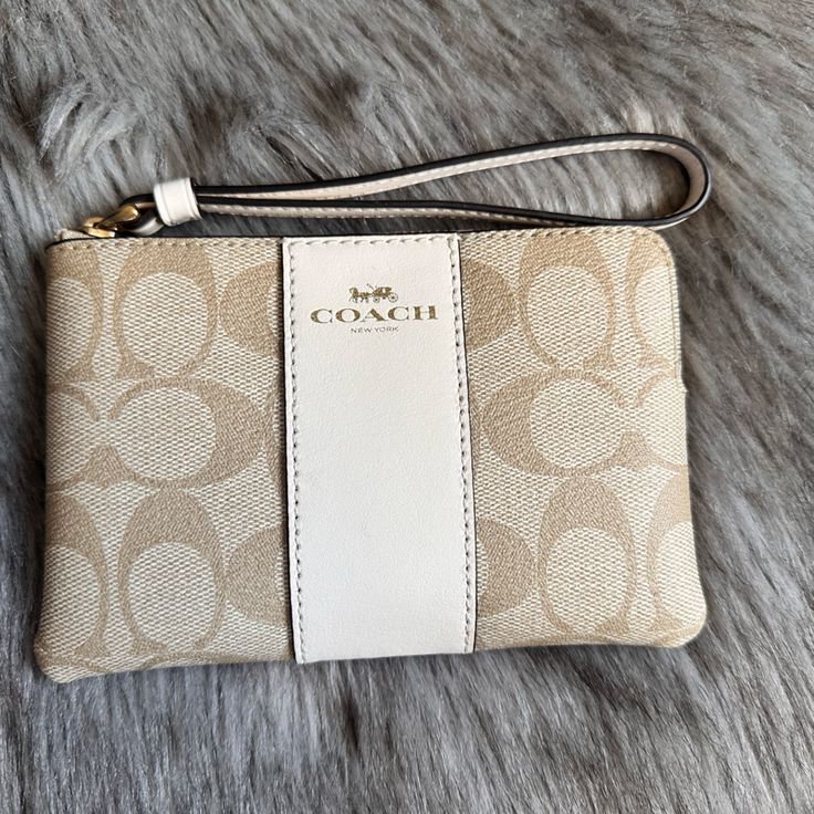 Coach Wristlet In Gold/Khaki Good As New Tags In Wristlet Card Holders Inside Wrist Strap Beige Rectangular Wristlet For Travel, Beige Rectangular Clutch With Wrist Strap, Beige Clutch With Wrist Strap For Gift, Beige Clutch With Wrist Strap As Gift, Chic Beige Bags With Wrist Strap, Coach Beige Pouch Wristlet, Beige Coach Pouch Wristlet, Cream Pouch Wristlet Gift, Cream Pouch Wristlet For Gift