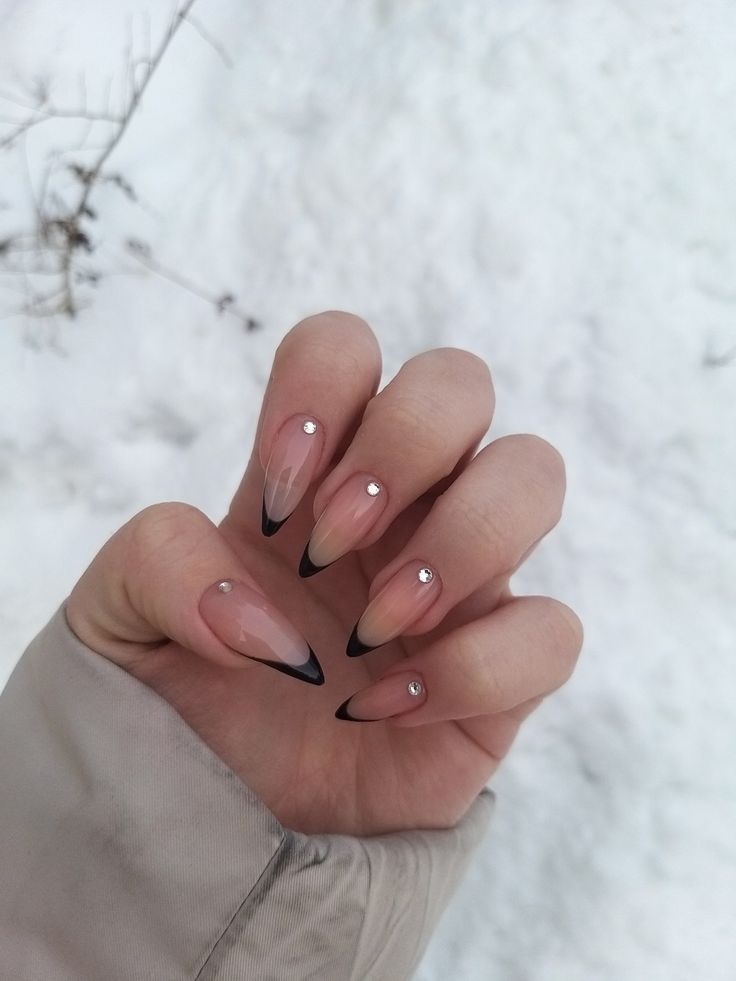 Matte Almond French Tip Nails, French Black Almond Nails, Black Tip French Manicure Almond, Almond Black French Tip Nails With Rhinestones, Black French Diamond Nails, Black French Tip Nails With Gems Almond, Black Reverse French Nails, Black Nail Ideas With Rhinestones, Spanish Tips Nails