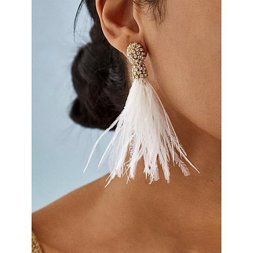 BAUBLEBAR Resha Pavé White Feather Earrings Your thing for dreamy style takes flight with this earring, a twinkly, Boho take on tassel designs.        Each approx. 4"L x 7/16"W     Goldtone finish     Pierced with bullet-disc backs     Clear glass stones Elegant Summer Tassel Earrings For Party, Elegant White Summer Tassel Earrings, Elegant Feather Dangle Jewelry, White Feather Dangle Earrings, White Tassel Earrings For Pierced Ears Party, Party Jewelry With Feather Dangles, Tassel Earrings For Wedding, Party Feather Dangle Jewelry, Party Jewelry With Dangle Feathers