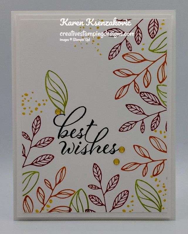 a card with the words best wishes written in black ink on it, surrounded by leaves