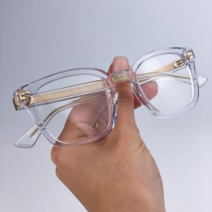 Gucci Gg0184o 011 Eyeglasses Crystal Clear Gold Square Unisex Brand - Gucci Model - Gg0184o Color Code - 011 Gender - Unisex Frame Colour - Crystal Clear Gold Frame Shape - Square Frame Style - Full Rim Frame Material - Acetate Lens Color - Demo Uv Protection - Category 3 Size - 50/21/145 100% Uv Protection Authentic! Full Retail Package With All Accessories. Have All Colors Of Gucci Cases In Stock. Feel Free To Message Me The Color Of Case You Would Like To Get When Making A Purchase. Made In I Gold Glasses Frames, Gold Glasses, Gucci Glasses, Silver Sunglasses, Sunglasses Women Oversized, Sunglasses Logo, Fashion Eye Glasses, Gucci Model, Tortoise Shell Sunglasses