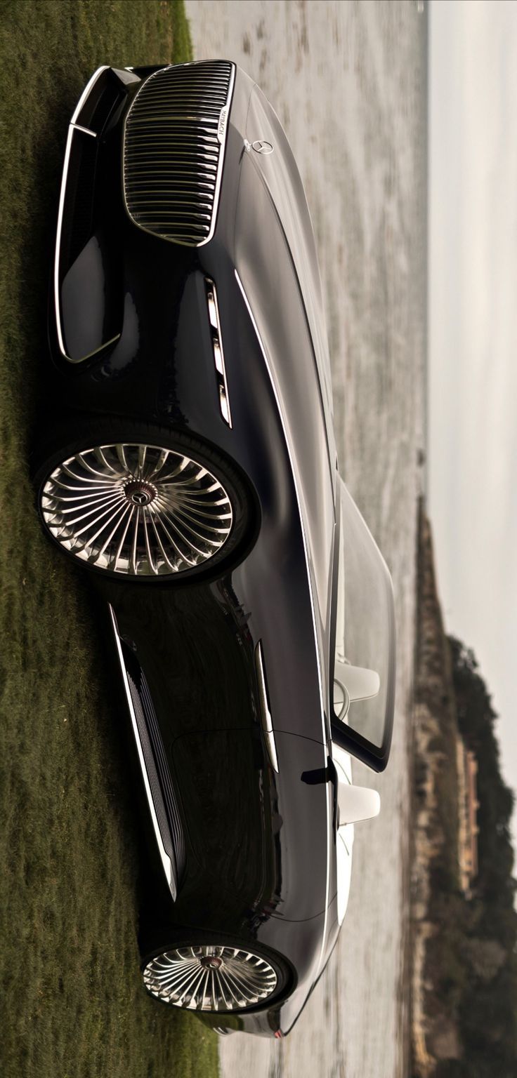 an aerial view of a black sports car