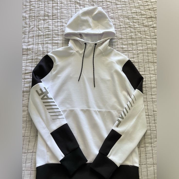 Size: Small Brand New With Tags In Good Condition White Double-lined Hood Sweatshirt For Winter, White Double-lined Hooded Sweatshirt For Winter, White Double-lined Hood Winter Sweatshirt, White Winter Sweatshirt, White Sports Hoodie With Adjustable Hood, Fall White Athleisure Sweatshirt, White Hoodie With Ribbed Cuffs For Athleisure, Urban White Sweatshirt For Sports, White Hoodie Sweatshirt