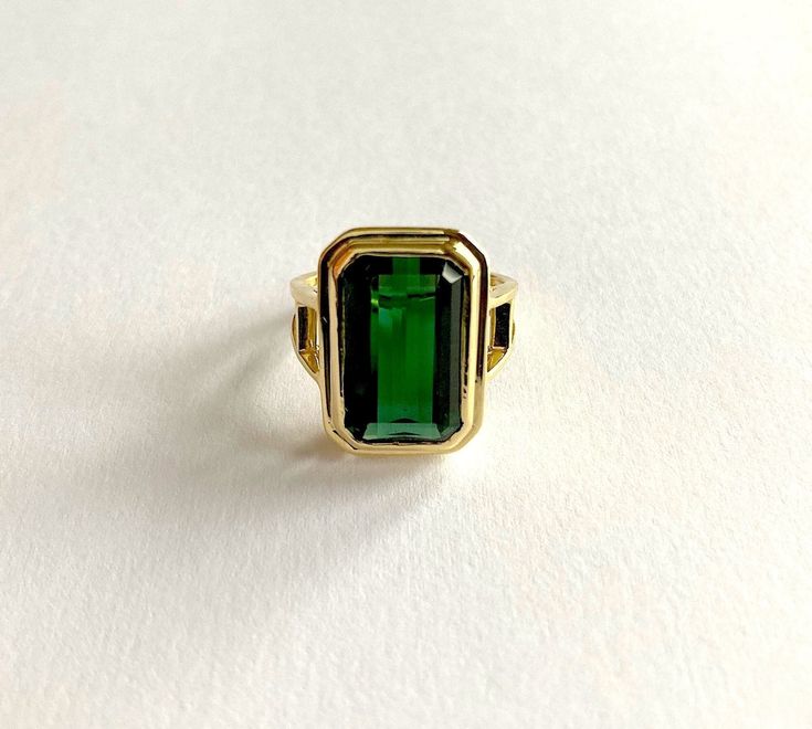 Absolutely stunning green emerald cut real Tourmaline statement ring. This ring is a handmade hallmarked 14ct yellow gold ring set with a large green octagon cut Tourmaline. The fine quality Tourmaline is a beautiful vibrant green and is in excellent condition.  This ring has been made in a classic timeless design and shows off the Tourmaline beautifully.  This ring probably dates from around 2000 +, but is a timeless design and doesn't look worn. The tourmaline will be from Brazil. This stone h Green Stone Ring, Green Tourmaline Ring, Vintage Cocktail Ring, Green Stone Rings, Gold And Green, Gold Ring Sets, Vintage Cocktail, Tourmaline Ring, Green Tourmaline