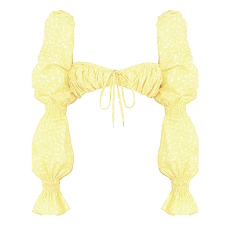 a yellow top with ruffles on the bottom and ties at the neckline