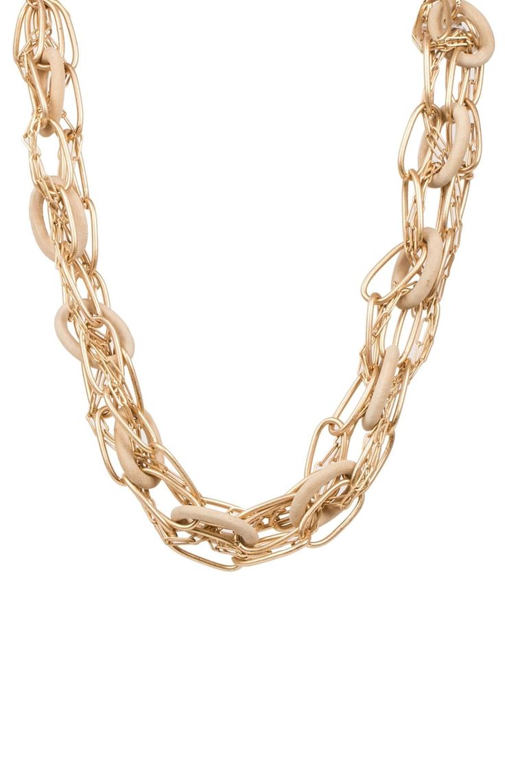 We've reimagined the dangling chain jewelry trend with our Nava Necklace. We gave these chains a modern twist by incorporating wood into the gold links. This necklace can be matched with any outfit, wear them solo or pair with our Nava Earrings and Bracelet. Size: Closed: 8", Open: 16", Width: 1" Lobster Clasp with Adjustable Chain Imported Chic Multi-strand Metal Chain Necklace, Chic Multi-strand Gold-tone Chain Necklace, Chic Gold-tone Multi-strand Chain Necklace, Trendy Multi-strand Gold Chain Necklace, Chic Multi-strand Chain Necklace With Adjustable Chain, Chic Multi-strand Adjustable Chain Necklace, Chic Gold-tone Long Chain Necklace, Multi-strand Chunky Chain Necklace, Chic Paperclip Chain Necklace