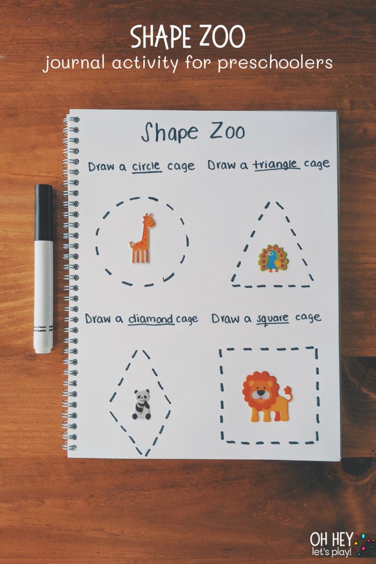 the shape zoo worksheet is shown on top of a wooden table with a pen