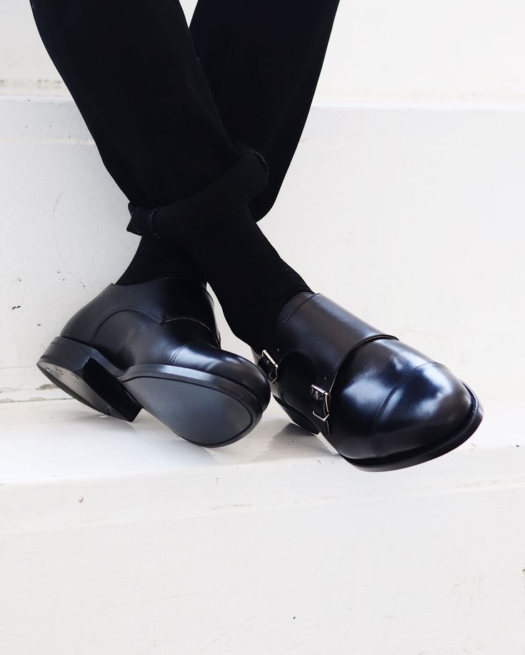 FREE SHIPPING. FREE RETURNS. FREE EXCHANGES. The 1980’s may not have been a great time for fashion. Low button stances, big shoulders, and big hair. But, it did give us one thing we’re happy about- the black double monk strap shoe. Our Morgan has a toe that’s neither too long nor too short, and a sleek-sloped leather upper with perfectly offset buckles. Wear this with your freshest suits, or try it with a V-neck T and some slim, dark denim. Made in Spain with an Italian leather upper and sole, s Black Monk Strap Shoes With Plain Toe, Black Plain Toe Monk Strap Shoes, Black Fitted Monk Strap Shoes With Plain Toe, Black Brogue Detailed Monk Strap Closed Toe Shoes, Fitted Black Monk Strap Shoes With Brogue Detailing, Black Fitted Monk Strap Shoes With Closed Toe, Fitted Black Monk Strap Shoes With Closed Toe, Black Monk Strap Shoes With Round Toe, Black Monk Strap Shoes With Buckle Closure