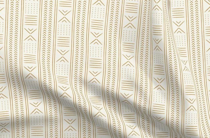 a white and beige pattern with lines on the fabric, as well as a shadow