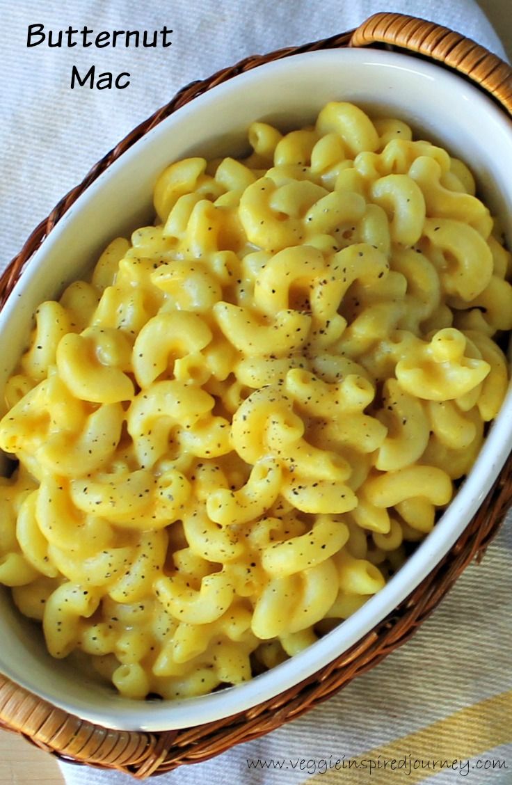 a white bowl filled with macaroni and cheese