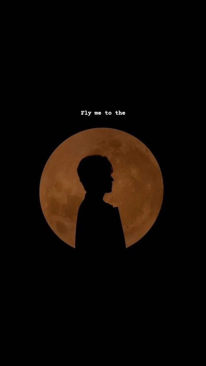 the silhouette of a person standing in front of a full moon with words written on it