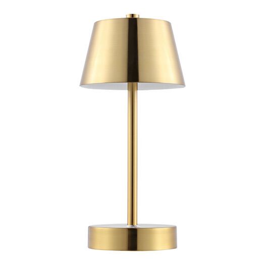 a gold table lamp on a white background