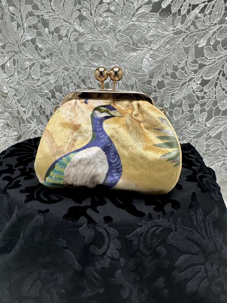 The "Large Marg" of coin purses...will hold just about anything...easy to find in your handbag even with a dark colored bag.   This bag is 5 inches long 6 inches high and 3 inches wide Daily Use Compact Bags With Coin Pocket, Compact Bags With Coin Pocket As Gift, Compact Bag With Coin Pocket For Gift, Gold Clutch Bag With Card Slots, Gold Evening Bag With Card Slots, Evening Pouch Shoulder Bag With Card Slots, Gold Handheld Pouch For Daily Use, Elegant Zipper Pouch Coin Purse, Gift Clutch Coin Purse