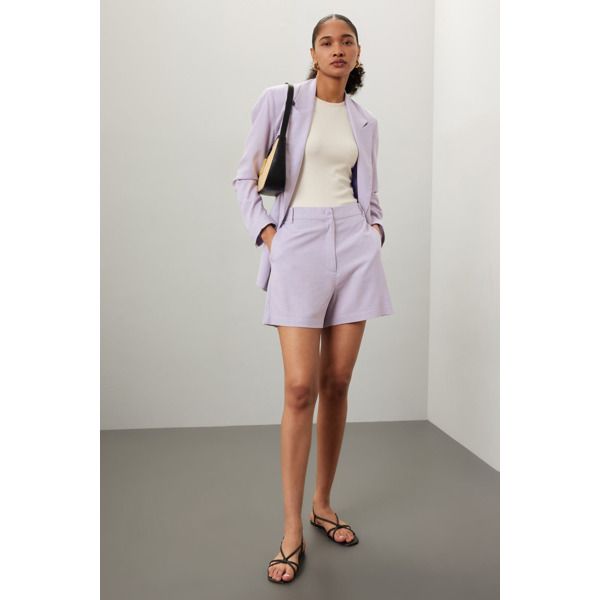 Linen blend. (70% Rayon, 30% Linen). Shorts. Front zipper fly with button closure. 4" Inseam. 16" Rise. 29" Leg opening. Imported.¬† High-waisted Shorts For Office In Spring, High-waisted Shorts For Spring Office Wear, High-waisted Shorts For Office In Summer, High-waisted Shorts For Summer Office Wear, High Waist Office Shorts For Spring, Tailored Shorts With Pockets, Business Casual Spring Shorts, Fitted Bermuda Shorts For Spring Day Out, Fitted High-waisted Bermuda Shorts For Work