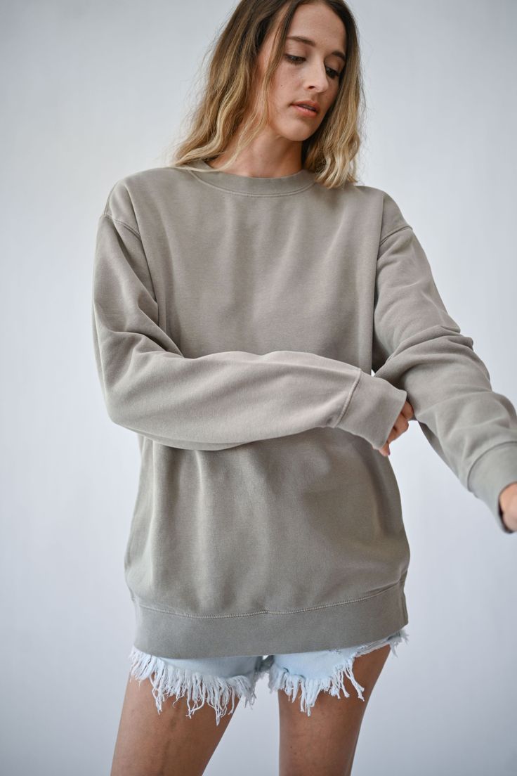 An oversized style, this cotton sweatshirt gets better with every wash. Created as a year-round closet staple, this piece easily packs in your travel bag for that surprising chilly night on vacation, or for a day of errands back home. We think you'll live in it!∙ Oversized, loose fit∙ Mid-weight, ultra-soft cotton and fleece∙ Crew neck with 1-inch ribbing at neck, 2.5-inch ribbing at cuffs and waist∙ Preshrunk. Due to pigment dye, machine wash with dark colors only. Tumble dry low For our oversi Round Closet, Closet Staples, Oversized Style, Slate Blue, On Vacation, Dark Colors, Travel Bag, Crewneck Sweatshirt, 1 Inch