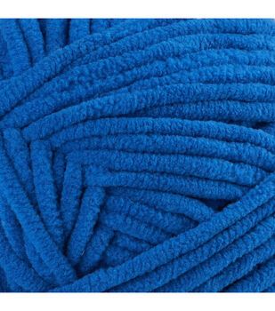 blue yarn is shown in close up