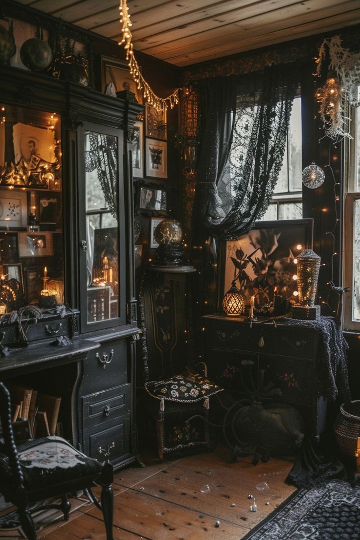 the room is decorated with black and gold decorations, including an old fashioned desk and chair