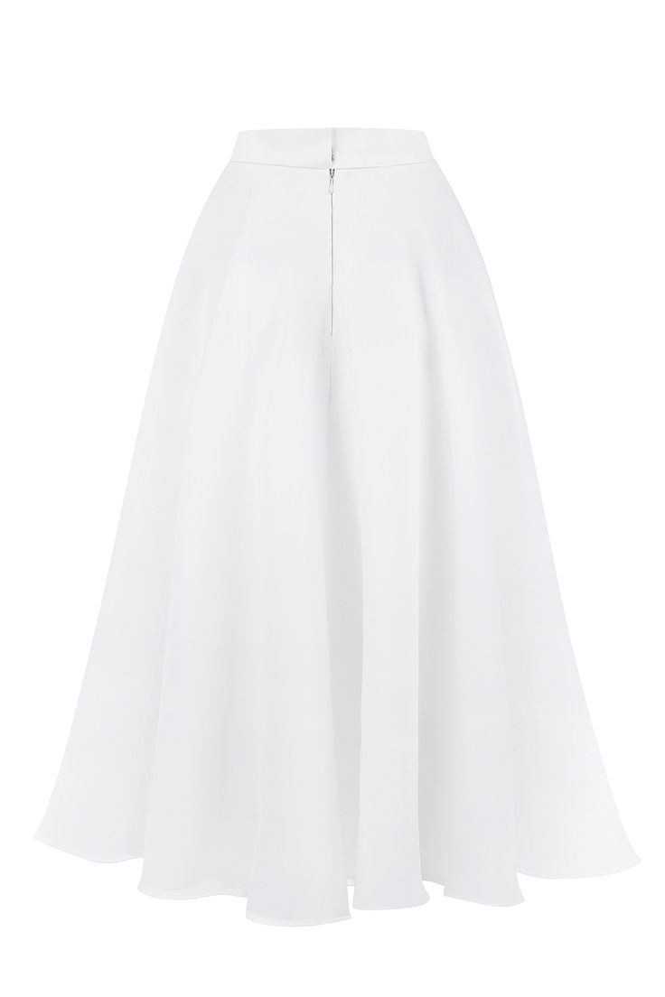 Elevate your bridal ensemble with the Stella Organza Skirt, a stunning organza midi skirt designed to add a modern touch to your wedding look. Crafted from premium organza fabric, this skirt offers a beautiful, airy silhouette that gracefully flows with every step you take. The high-waisted design is complemented by a discreet zip closure, ensuring a seamless and elegant fit. This versatile piece can be paired with a variety of tops to create a unique and personalized bridal outfit. The Stella O Organza Midi Skirt, Organza Bridal, Belle Silhouette, Organza Skirt, Bridal Outfit, Wedding Look, Modern Bridal, Organza Fabric, Art Dress