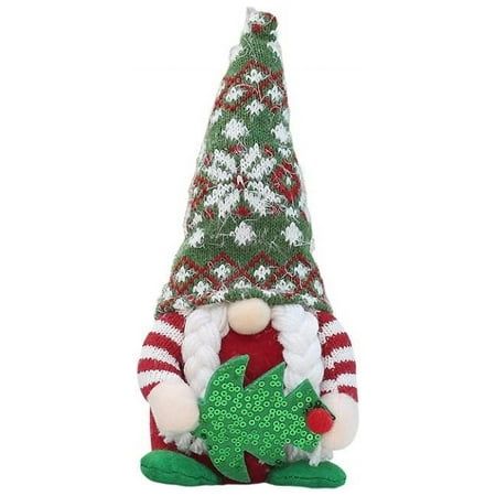 a stuffed toy with a christmas tree on it's head and legs, sitting in front of a white background