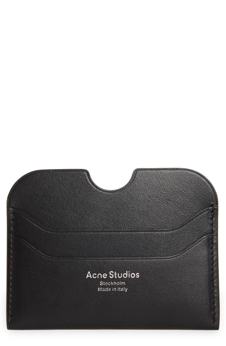 a black card case with the name acne studios on it