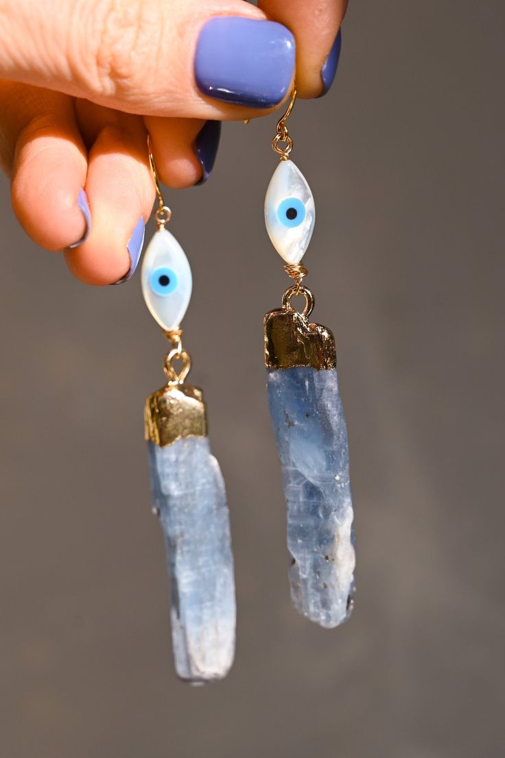 kyanite crystal evil eye dangle earrings Wizard Jewelry, Throat Chakra Crystals, Kyanite Earrings, Speak Your Truth, Amazing Finds, Crafts Room, High Vibrational, Evil Eyes, Evil Eye Earrings