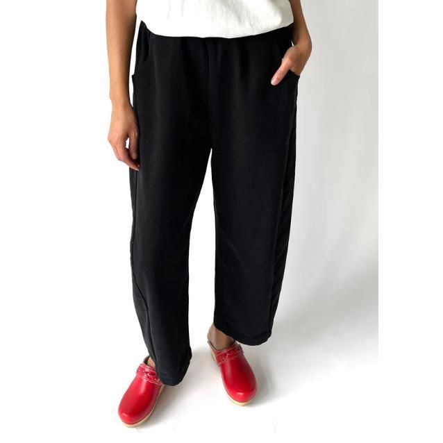 Le Bon Shoppe - Arc Pants | Black Canvas Why We Made This? These Are The Pants We Love To Live In! She Has Thoughtful Design Details Like An Elastic High Waist That Gives You A Room To Breath, Slightly Curved Leg Shape, Cropped Length To Show Off Your Favorite Socks And Shoes, Unique Side Panels And Deep Pockets. The Heavy-Weight Canvas Material Likely Adds Durability And Gives Them A Structured Look. The Arc Pants Would Make A Great Addition To Everyone's Wardrobe And Complement To All The Le B Black Harem Pants For Loungewear With Loose Fit, Black Relaxed Fit Pants For Spring, Chic Black Pants With Side Pockets, Spring Black Straight Leg Harem Pants, Chic Black Harem Pants With Relaxed Fit, Chic Black Harem Pants With Pockets, Black Straight Leg Harem Pants For Fall, Black Harem Pants For Loungewear, Black Pants With Elastic Waistband And Relaxed Fit