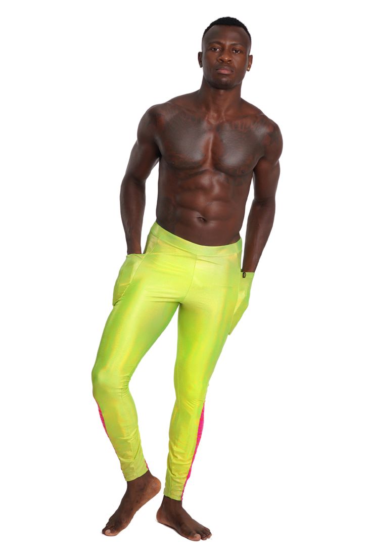 Tropic like its hot in the Limelight Meggings. Your neon dreams have come true in these bright AF neon green mens leggings. Bonus they are blacklight responsive so they will give you the glow at fluro party. FEATURES: Holographic neon green chartreuse spandex and contrast panels in holographic hot pink tiger print spandex UV Glow blacklight responsive fabric Contouring panels at the calf and thigh Two side pockets deep enough for a cell phone and wallet Made with the highest quality 4 way stretc Sporty Neon Bottoms For Sports, Neon Sports Bottoms, Sporty Neon Stretch Bottoms, Fitted Green Bottoms For Rave, Neon Yellow Stretch Workout Bottoms, Stretch Rave Bottoms For Streetwear, Fluro Party, Rainy Festival Outfit, Neon Rave Outfits