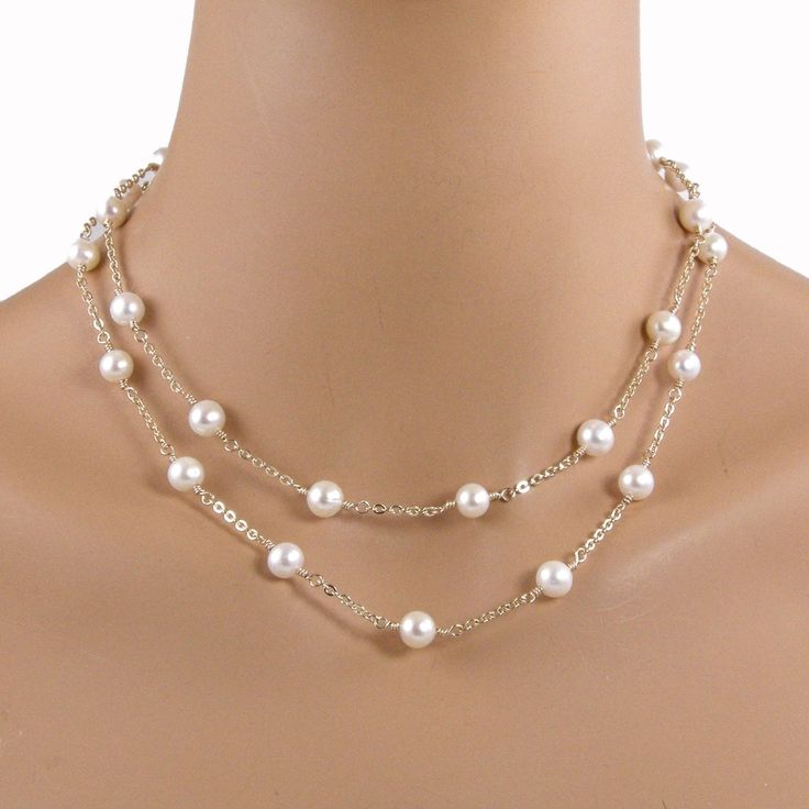 Lovely tin cup necklace made with 8mm white freshwater pearls and 14k gold filled chain. Each pearl is individually hand wrapped onto the chain. The necklace is 36 inches (91.44cm) long with a 14k gold filled lobster clasp. The necklace can be worn as one long strand or can be wrapped around and doubled for a layered look. The necklace will arrive in an attractive gift box. This necklace is available in sterling silver here: https://www.etsy.com/listing/945600163/long-tin-cup-necklace-white-pear White Pearl Gold Necklace, Small Pearl Necklace, Teardrop Pearl Earrings, Tin Cup, Dainty Pearl Necklace, Girlfriend Jewelry, Single Pearl Necklace, Pearl Necklace Designs, Pearl Jewelry Wedding