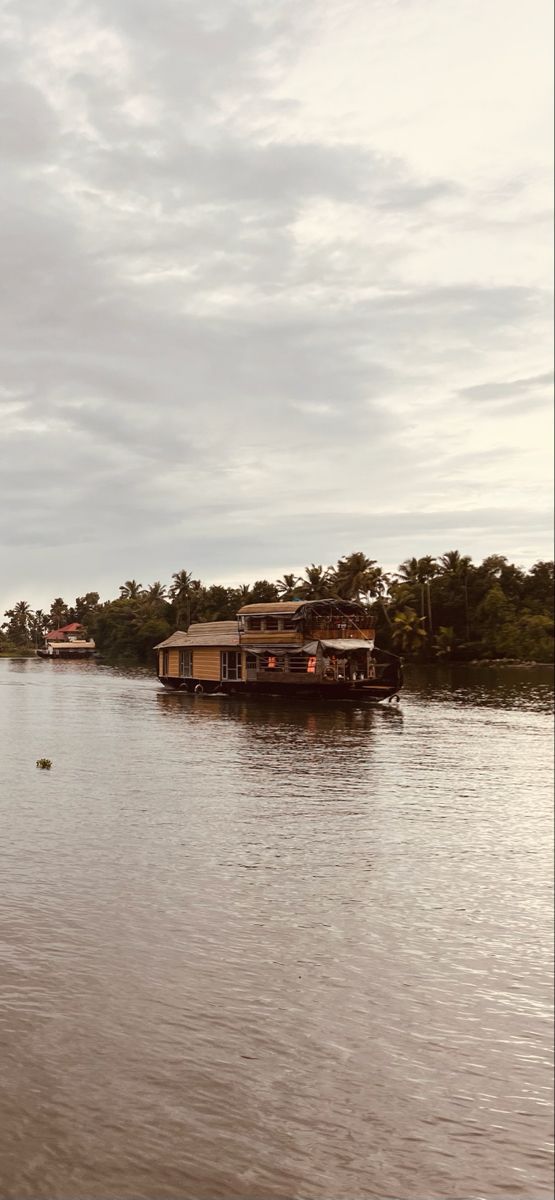 there is a house boat on the water