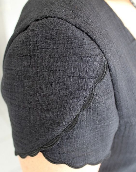 the back of a person's head with a piece of fabric on top of it