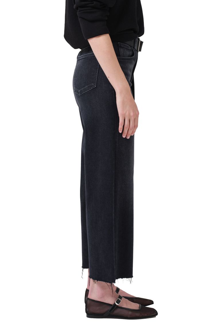 Wispy raw hems lend laid-back style to these swingy wide-leg jeans cut from stretchy denim that has a beautiful dark wash. 27" inseam; 24" leg opening; 11 1/2" front rise Zip fly with button closure Five-pocket style 71% cotton, 23% modal, 4% elastomultiester, 2% elastane Machine wash, tumble dry Made in Turkey Washed Black High-rise Flare Jeans With Frayed Hem, High Rise Washed Black Flare Jeans With Frayed Hem, Washed Black High Rise Flare Jeans With Frayed Hem, Washed Black Wide Leg Bottoms With Frayed Hem, Wide Leg Jeans With Frayed Hem In Dark Wash, Washed Black Denim Flare Jeans With Frayed Hem, Wide Leg Dark Wash Jeans With Frayed Hem, Dark Wash Wide Leg Flare Jeans With Frayed Hem, School Wear