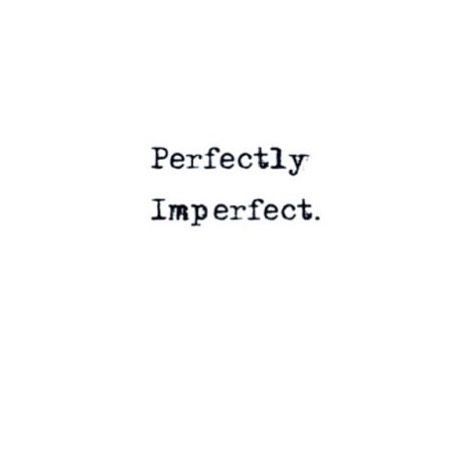 the words perfectly imperfect are written in black ink on a white paper with an image of a