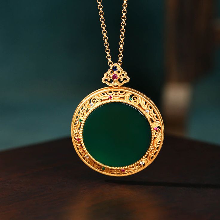 This Clouds Jade Plate Pendant Necklace is made with exquisite craftsmanship for a delicate and elegant look. It is crafted with one-of-a-kind natural jade stones to ensure long-lasting wear and unique beauty. This special necklace makes a perfect gift for any special occasion.

Natural emerald Jade stone
Chain length: 45 CM (+ 5 cm adjustable chain)
24K gold
Pendant size: 34*42mm
Adjustable lobster clasp size - one size fits all
Hypoallergenic, lead and nickel free

If you aren't in LOVE with y