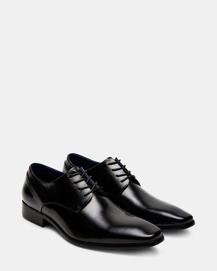 Introducing the GEMARI oxford dress shoe. Designed with a lace-up style and sleek almond toe, this shoe exudes sophistication and professionalism. Made with high-quality buffalo leather for superior comfort and durability. Perfect for any formal or business occasion. 1 inch heel height Leather upper material Textile and synthetic lining Textile and synthetic sock Rubber sole Imported Black Leather Wedding Shoes, Black Formal Shoes Women, Wedding Groom Shoes, Formal Black Shoes, Black Formal Shoes For Men, Black Dress Shoes Men, Black Suit Shoes, Leather Wedding Shoes, Black Formal Shoes