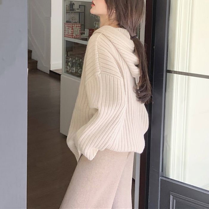 This beige knit hoodie features ribbed construction, a cozy loose fit, and a button-up closure in front Size:• S: Bust: 116cm/ 45.7 in, Length: 68cm/ 26.8 in, Sleeves: 51cm/ 20.1 in• M: Bust: 118cm/ 46.5 in, Length: 69cm/ 27.2 in, Sleeves: 52cm/ 20.5 in• L: Bust: 120cm/ 47.2 in, Length: 69cm/ 27.2 in, Sleeves: 52cm/ 20.5 in• XL: Bust: 122cm/ 48.0 in, Length: 70cm/ 27.6 in, Sleeves: 53cm/ 20.9 in• 2XL: Bust: 124cm/ 48.8 in, Length: 70cm/ 27.6 in, Sleeves: 53cm/ 20.9 in• 3XL: Bust: 126cm/ 49.6 in, Beige Winter Sweater With Ribbed Cuffs, Beige Ribbed Cuff Sweater For Winter, Winter Ribbed Neutral Sweater, Cozy Ribbed Neutral Sweater, Casual Warm Beige Cardigan, Casual Neutral Sweater For Winter, Warm Beige Casual Cardigan, Casual Neutral Winter Sweater, Oversized Soft Knit Hoodie