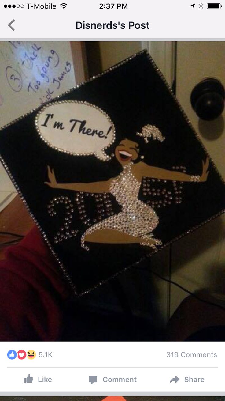 someone is holding up a black and white graduation cap that says i'm there