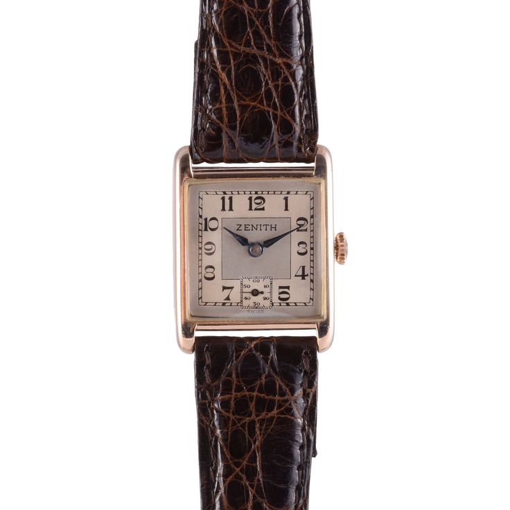 Vintage Swiss Zenith Art Deco mens rose gold wrist watch, circa 1930. This 9 karat rose gold square case wrist watch features a restored original silver dial and enamel numerals. The Zenith Art Deco watch has a 17 jewel movement. Case #75834, 9-1/2 ligne. [SSHO 412] Warranty This watch comes with a full 18 month warranty from the date of purchase. Antique Rectangular Watch Band For Formal Occasions, Classic Square Watch For Formal Occasions, Classic Square Formal Watches, Classic Square Watches For Formal Occasions, Art Deco Rectangular Watch With Diamond Hour Markers, Art Deco Rectangular Watch With Diamond Markers, Art Deco Formal Rectangular Watch, Formal Art Deco Rectangular Watch, Classic Square Watches With Diamond Hour Markers